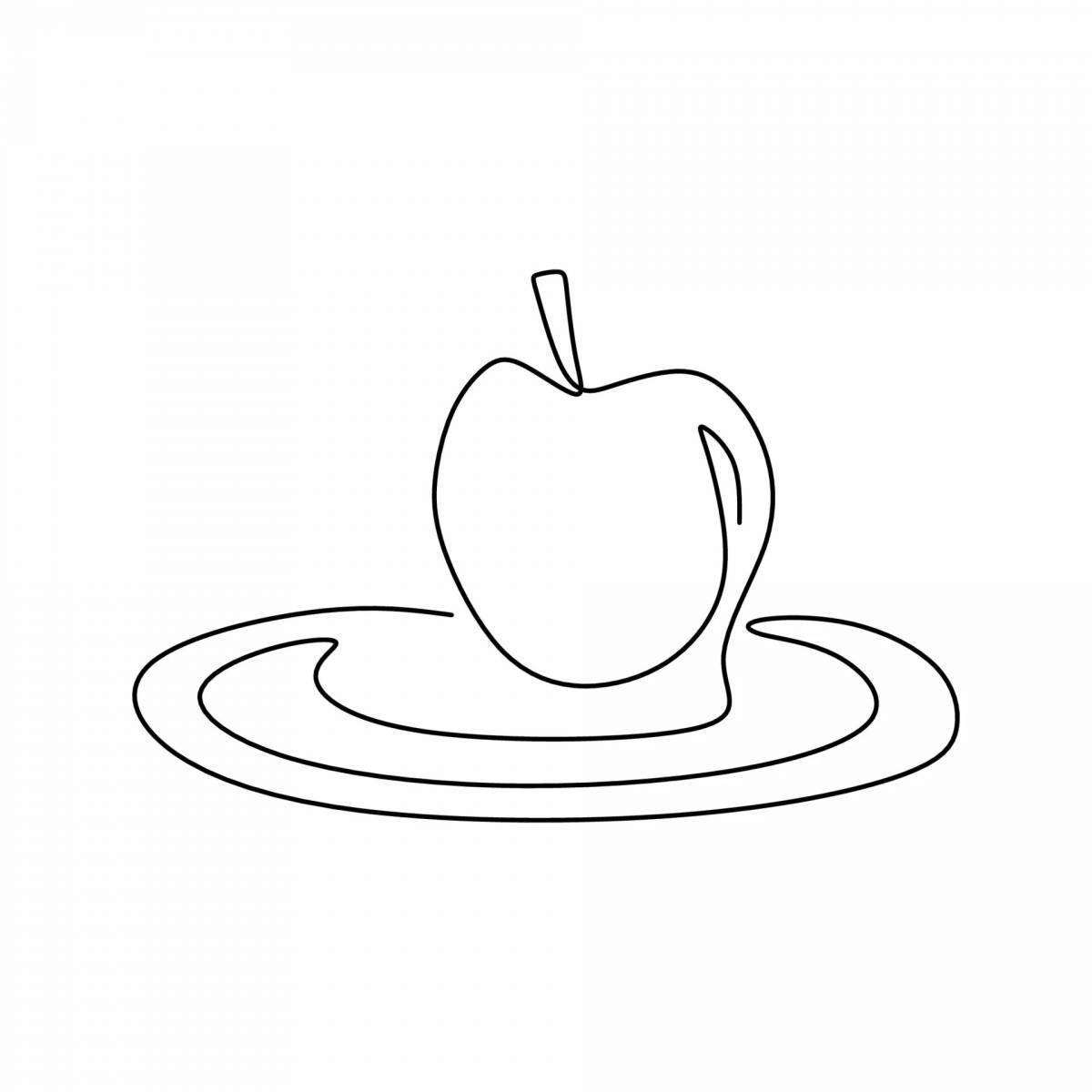 Вкусное яблоко на тарелке