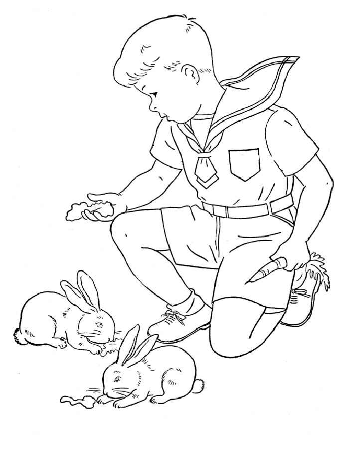 Фото Мальчик с кроликами