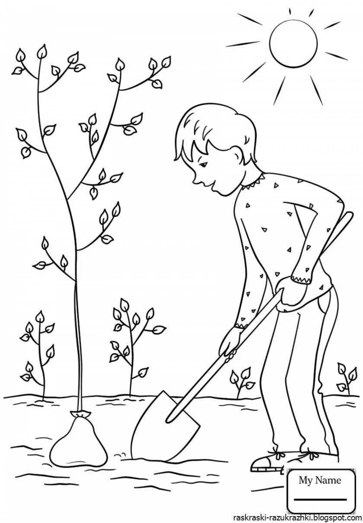 Мальчик сажает дерево