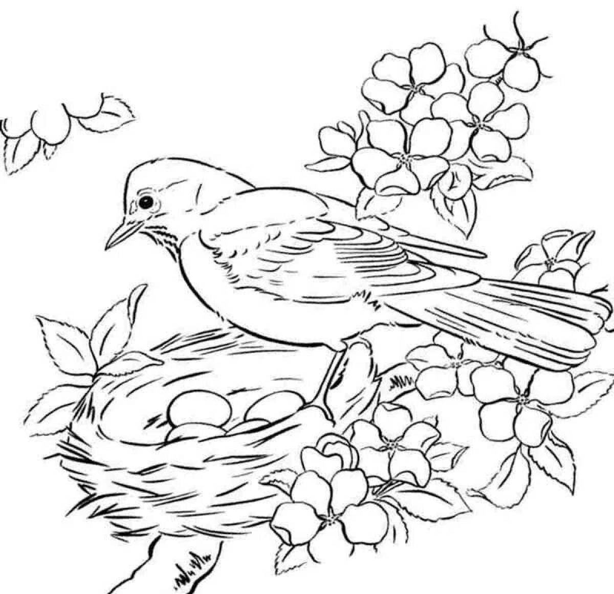 Порхающая птица на ветке