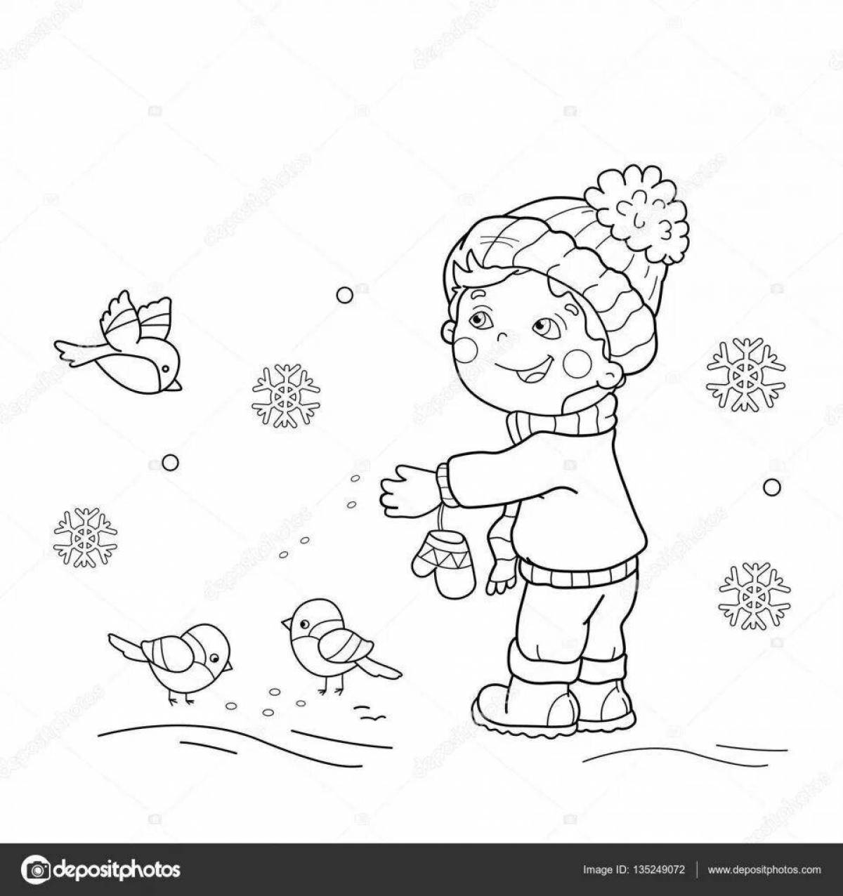 Joyful children feed the birds at the bird feeder in winter