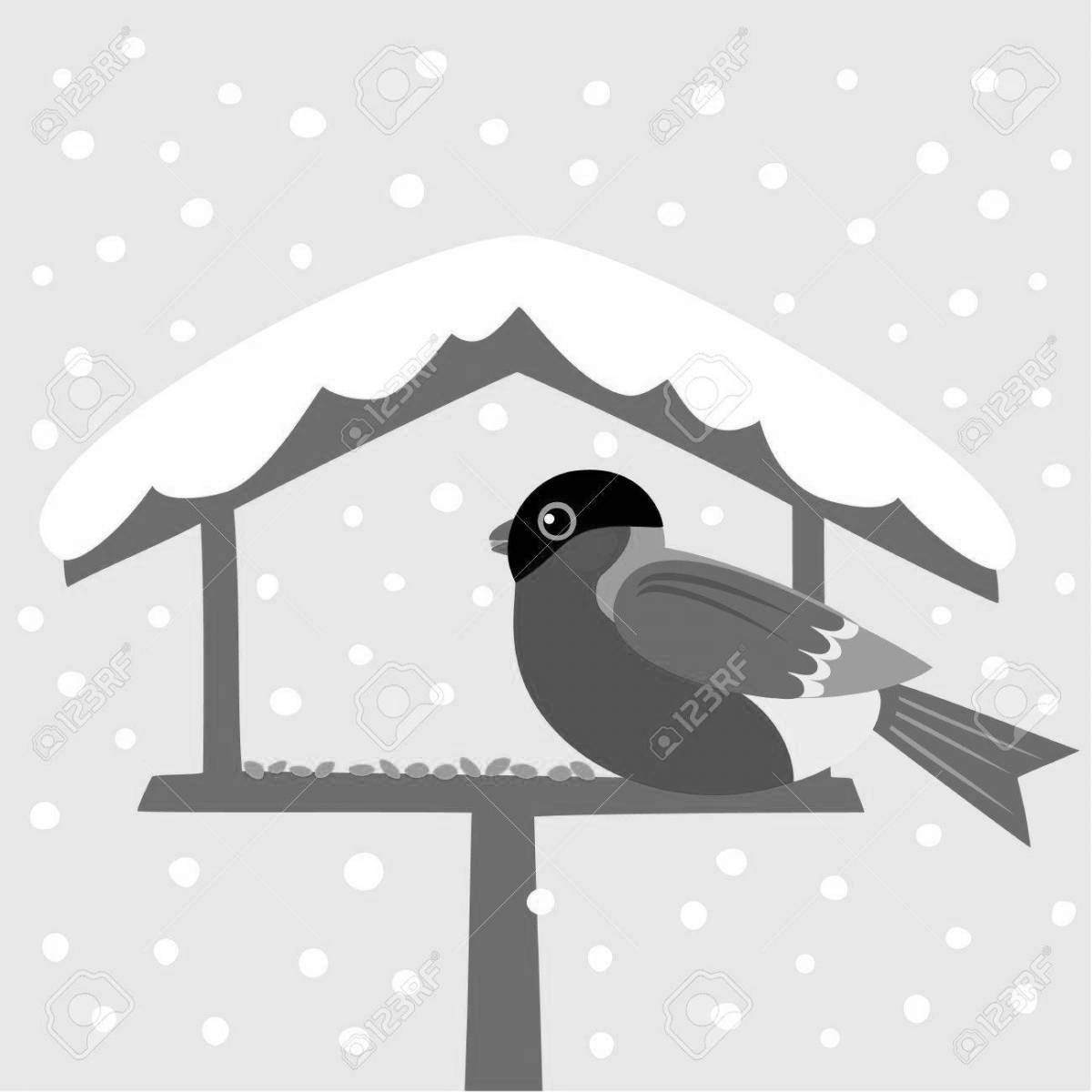 Заботливые дети кормят птиц зимой у кормушки
