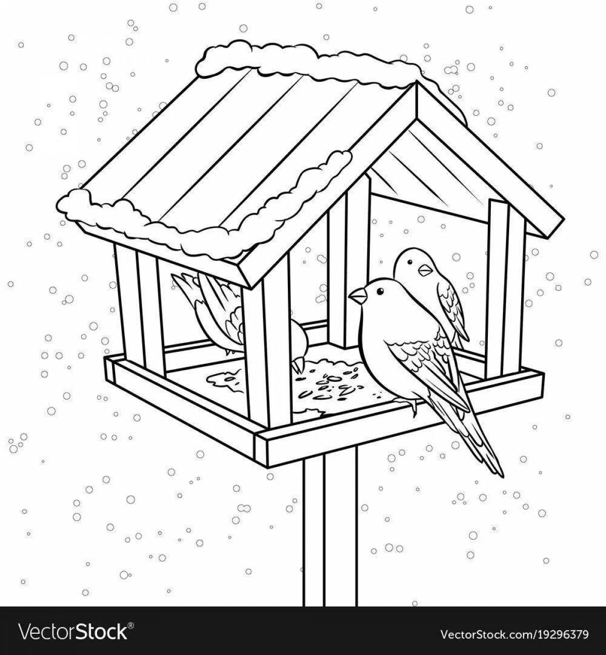 Serene children feed the birds at the bird feeder in winter