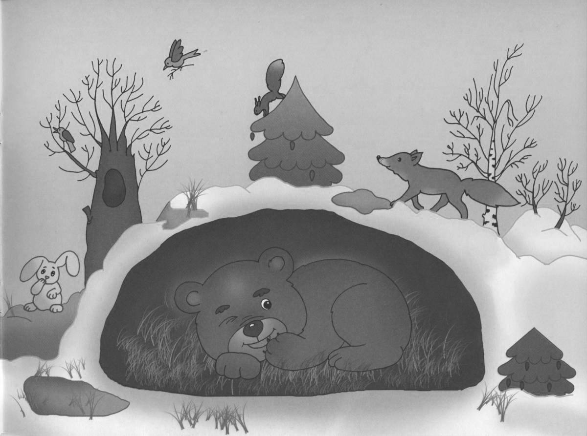 Fluffy bear in a den in winter