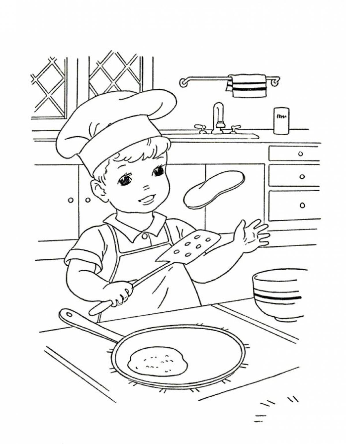 Boy baking pancakes