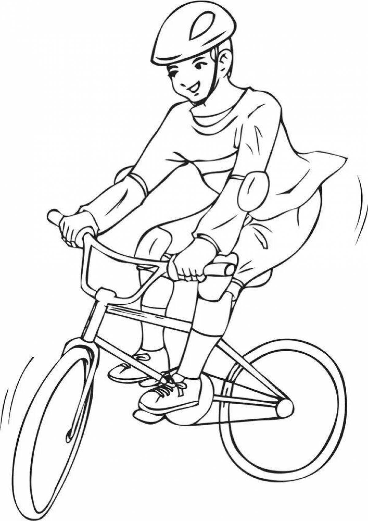 Фото Яркий мальчик на велосипеде