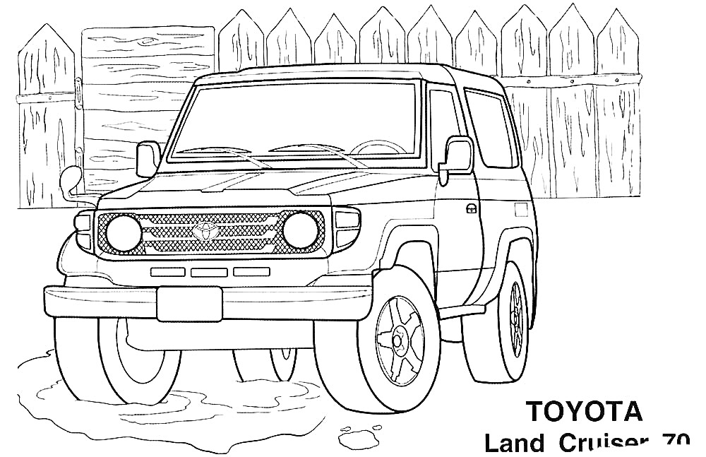 Toyota Land Cruiser 70 на фоне деревянного забора, колеса на грунтовке, боковой зеркала видны, передняя часть автомобиля с решеткой радиатора