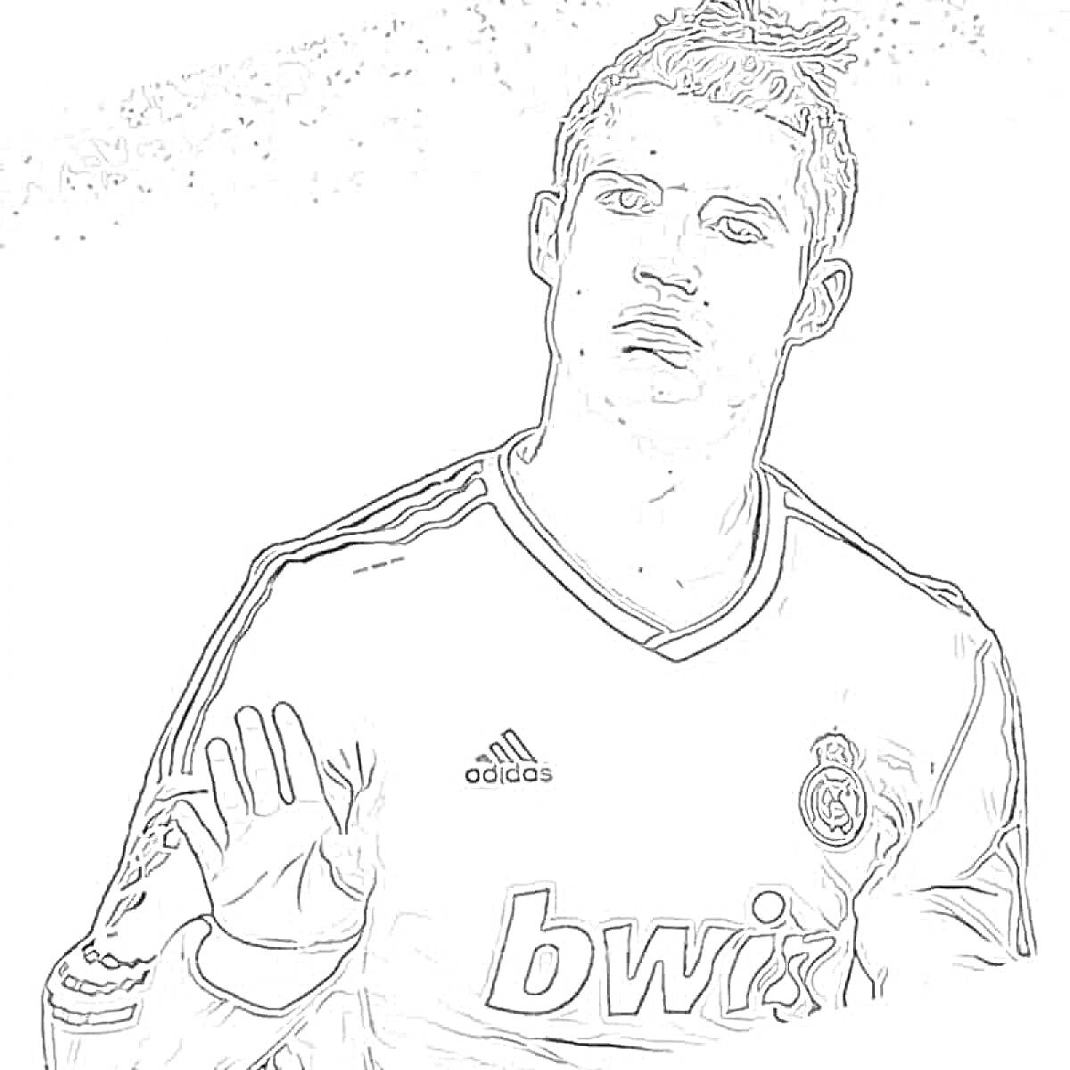 Футболист в футболке Реал Мадрид с поднятой рукой