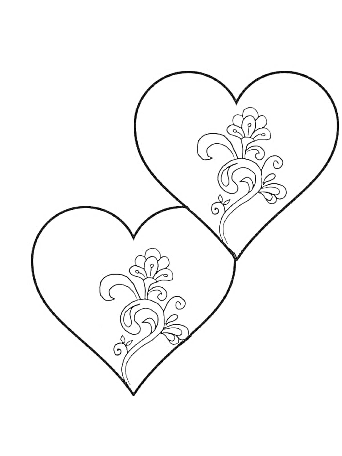 Раскраска Два пересекающихся сердца с узором из виньеток и цветов