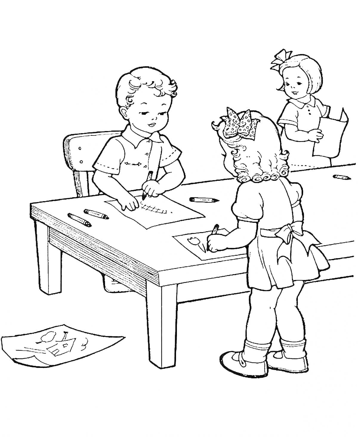 Раскраска Дети рисуют в классе - мальчик и девочка сидят за столом, девочка стоит, бумага и карандаши на столе, рисунок на полу