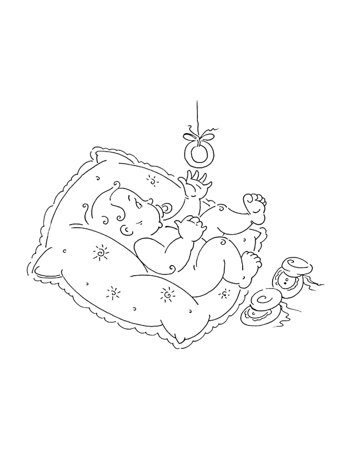 Раскраска Младенец на подушке с погремушкой и ботиночками