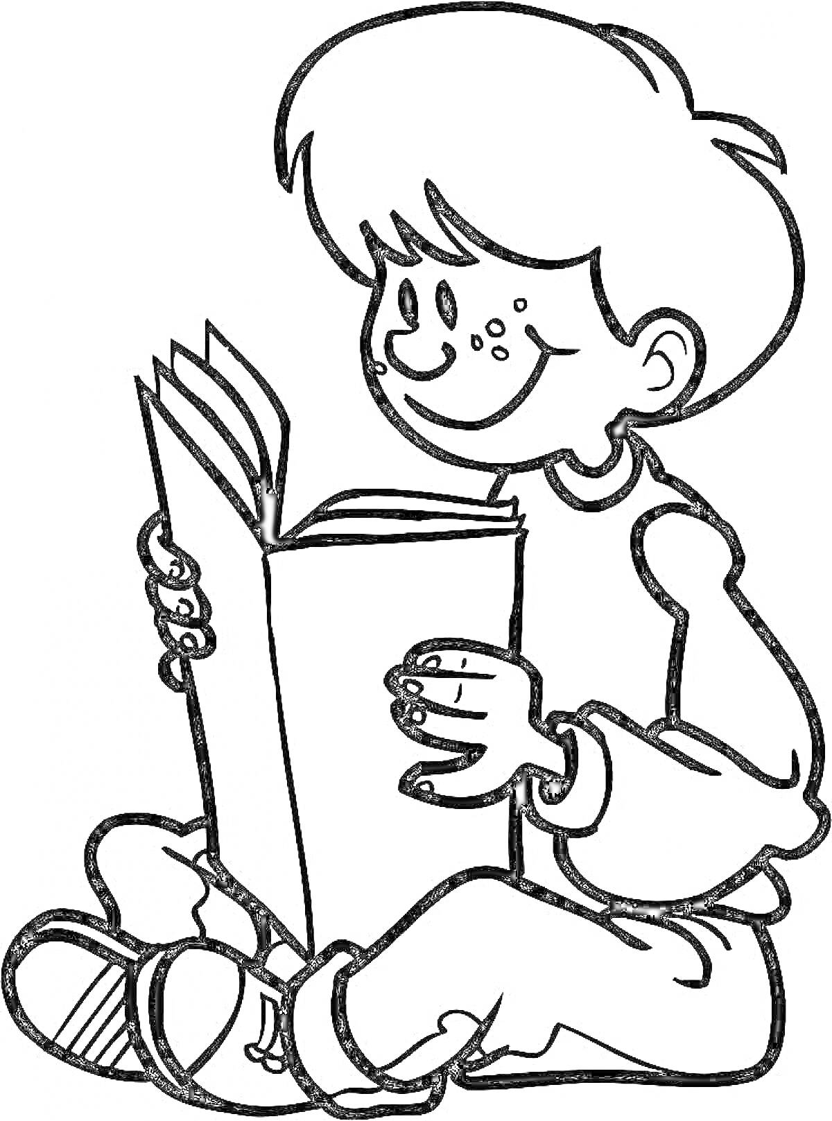 Раскраска Мальчик читает книгу, сидя на полу