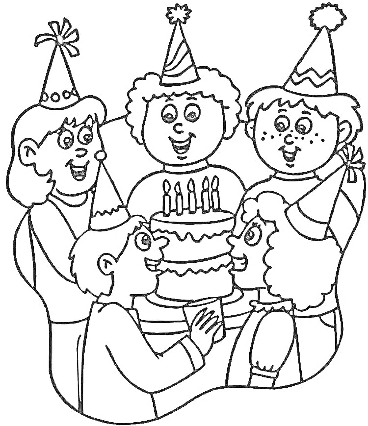дети с праздничными колпаками вокруг торта с зажженными свечами на вечеринке