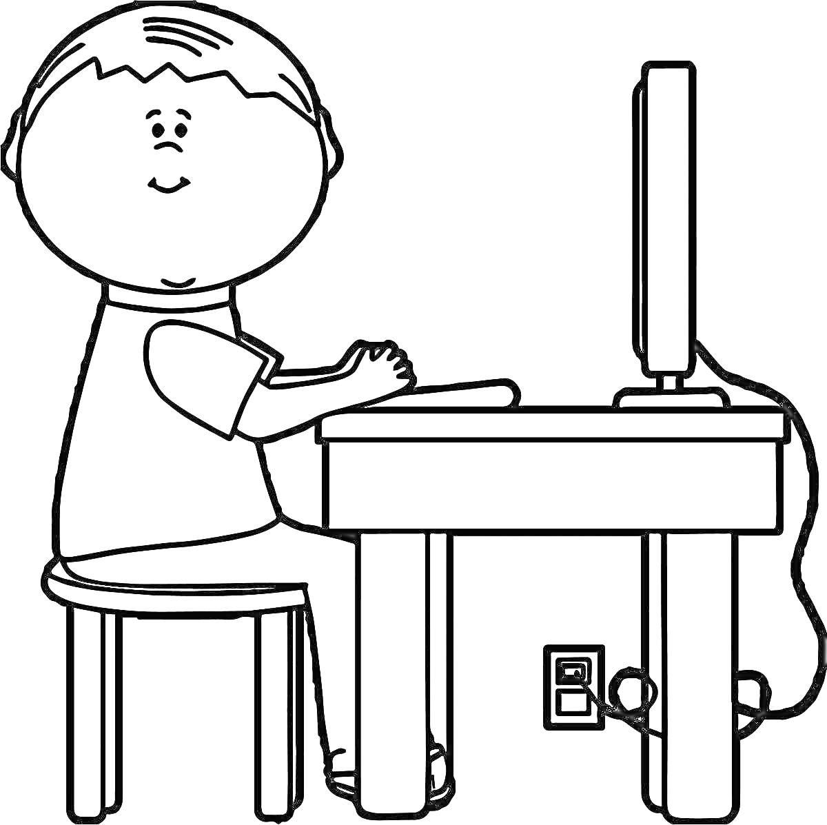 Ребенок за компьютером, сидящий на стуле у стола с включенным монитором