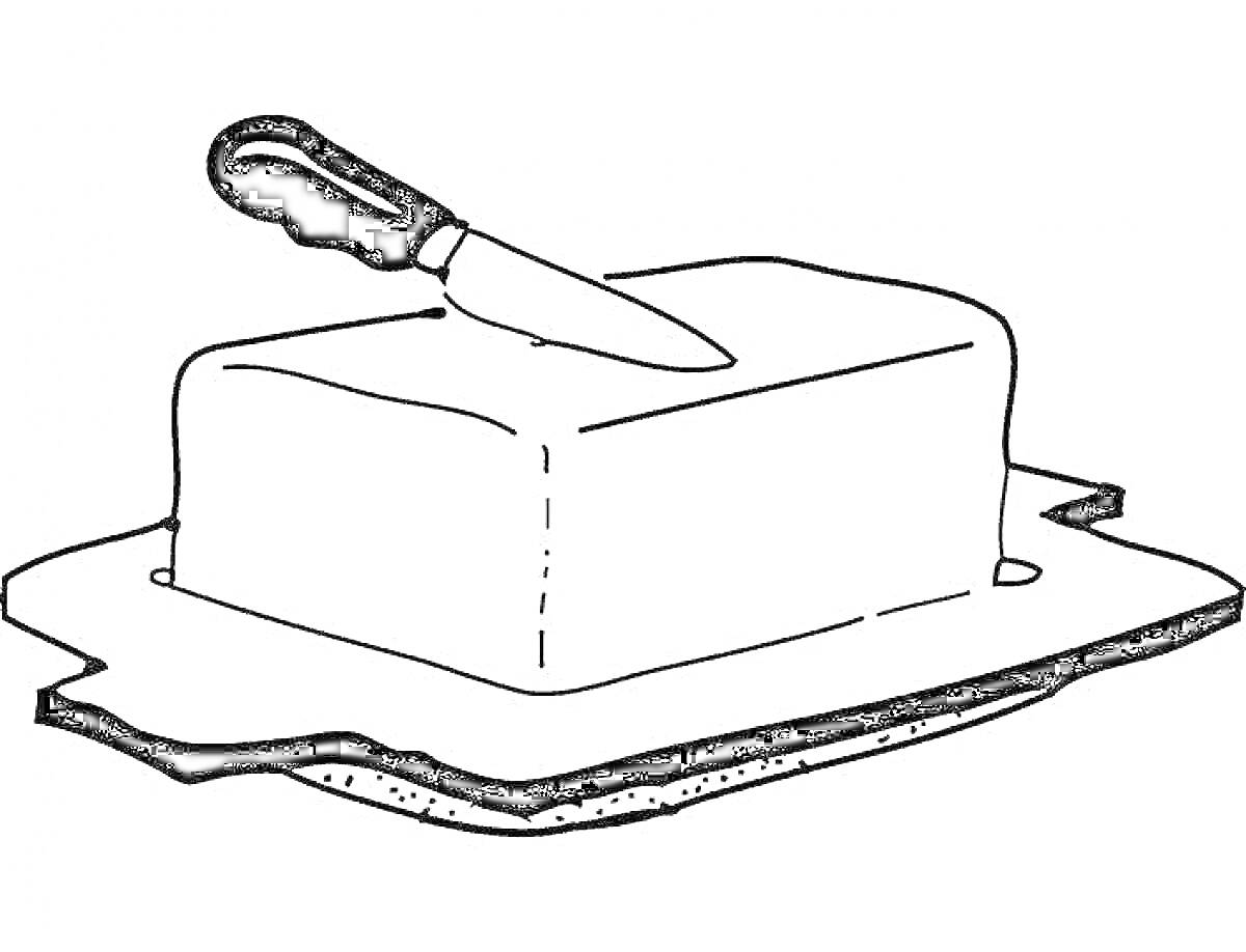 Кусок сливочного масла на тарелке с ножом