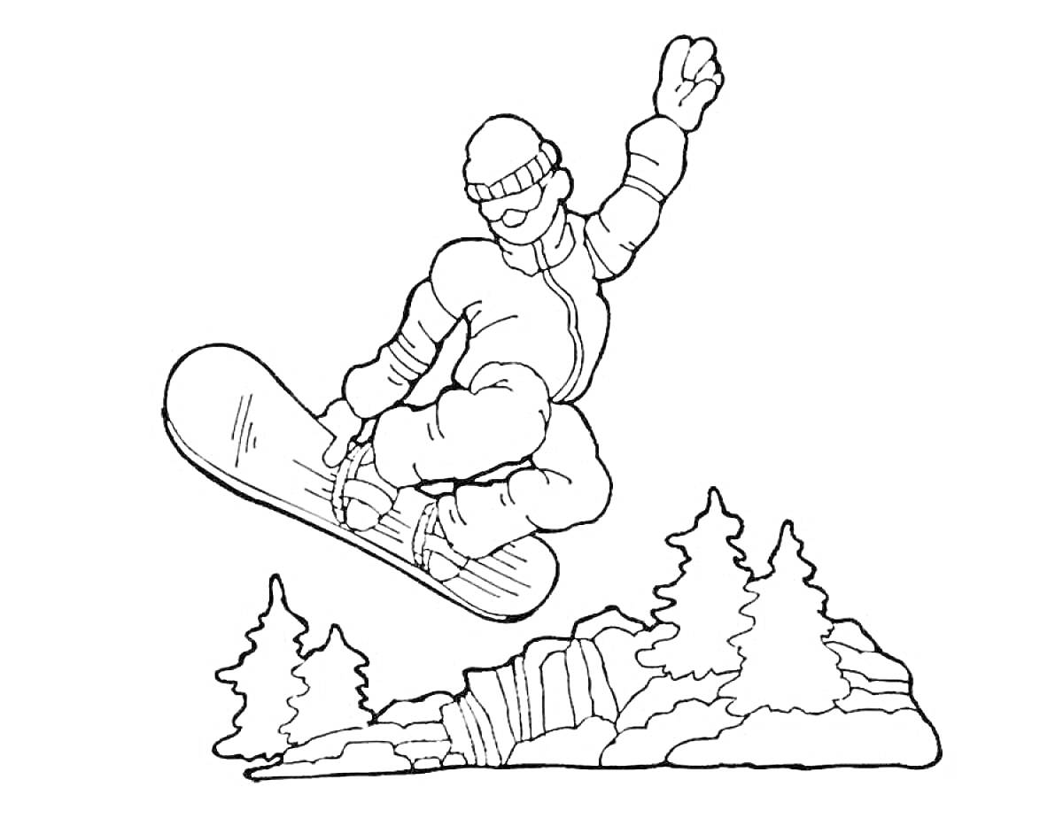 Сноубордист в прыжке над заснеженным пейзажем с елками