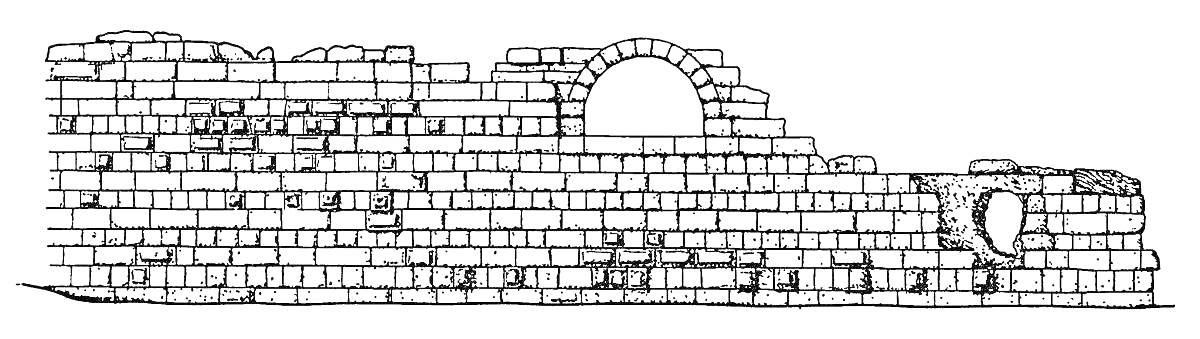 Каменная стена с арочным окном и разрушенной частью