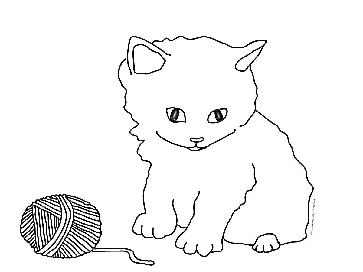 Котенок с клубком ниток