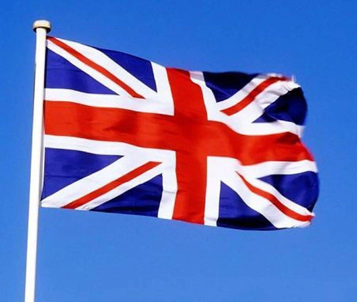 Почему в британии приспущены флаги. Флаг United Kingdom. Флаг Грейт Британ. Флаг Юнион Джек фото. Флажок Великобритании.