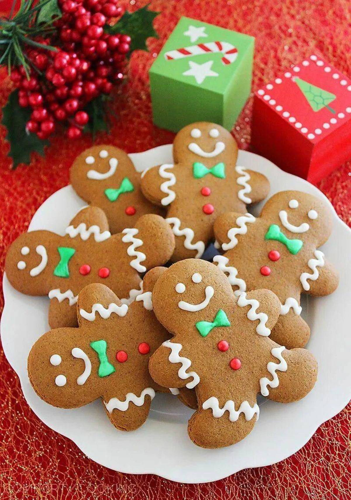 Имбирное печенье без. Пряничный человечек Gingerbread man. Рождественские имбирные пряники. Рождественское печенье. Новогодние печеньки.