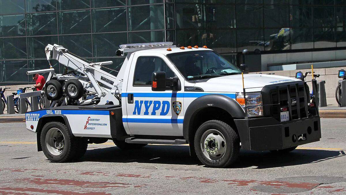 Грузовик полиция. Эвакуатор NYPD Police. New York Police Department грузовик. Полицейский фургон NYPD. Шерифф эвакуатор.